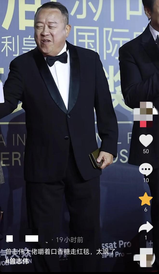 嚼口香糖与金沙总裁骑旋转木马挺幼稚凯发网址曾志伟澳门参加电影节台上(图4)